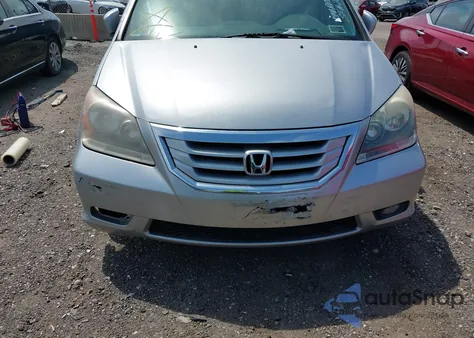 2010 Honda Odyssey Ex-L from USA, damaged, VIN 5FNRL3H63AB047891